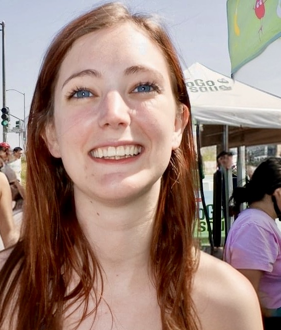 a woman with long red hair