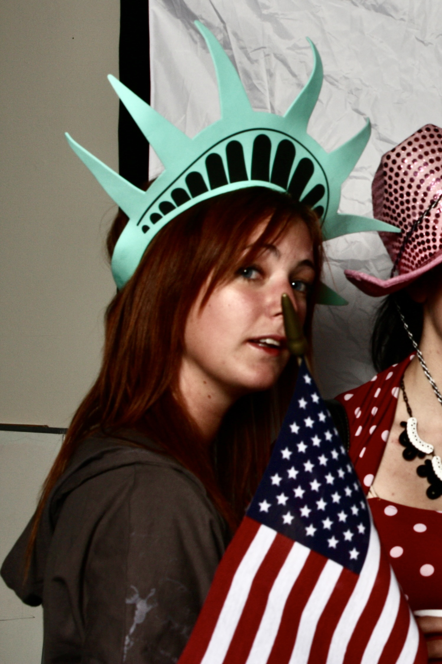 two women dressed as the statue of liberty