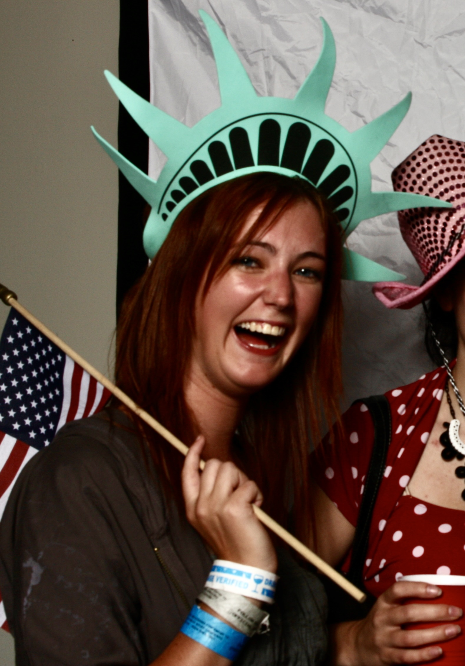 two women dressed as the statue of liberty