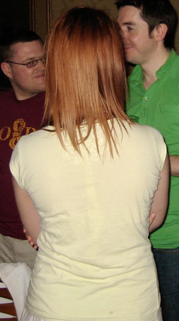 a man and woman standing in a room