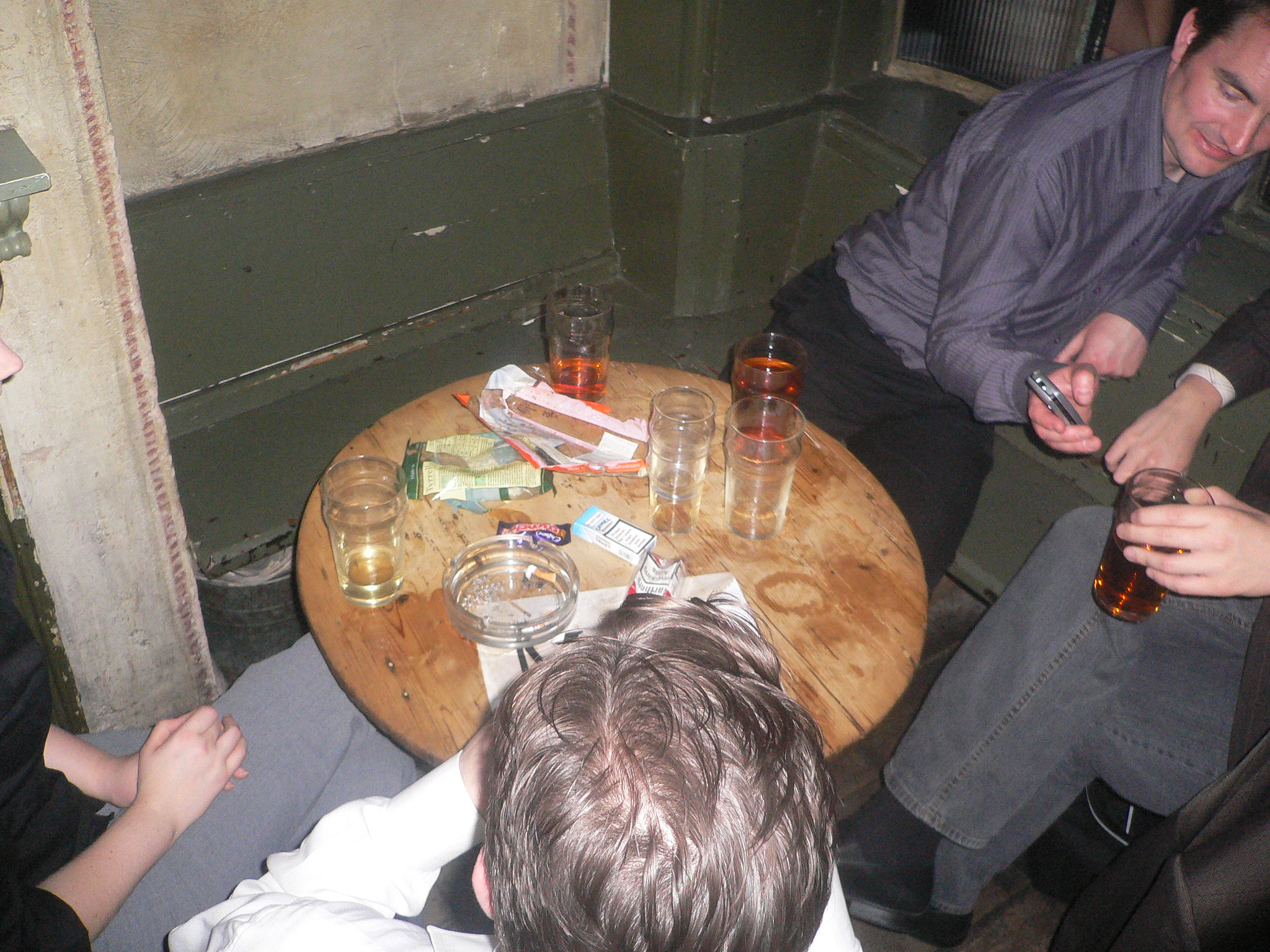 a group of people sitting around a table