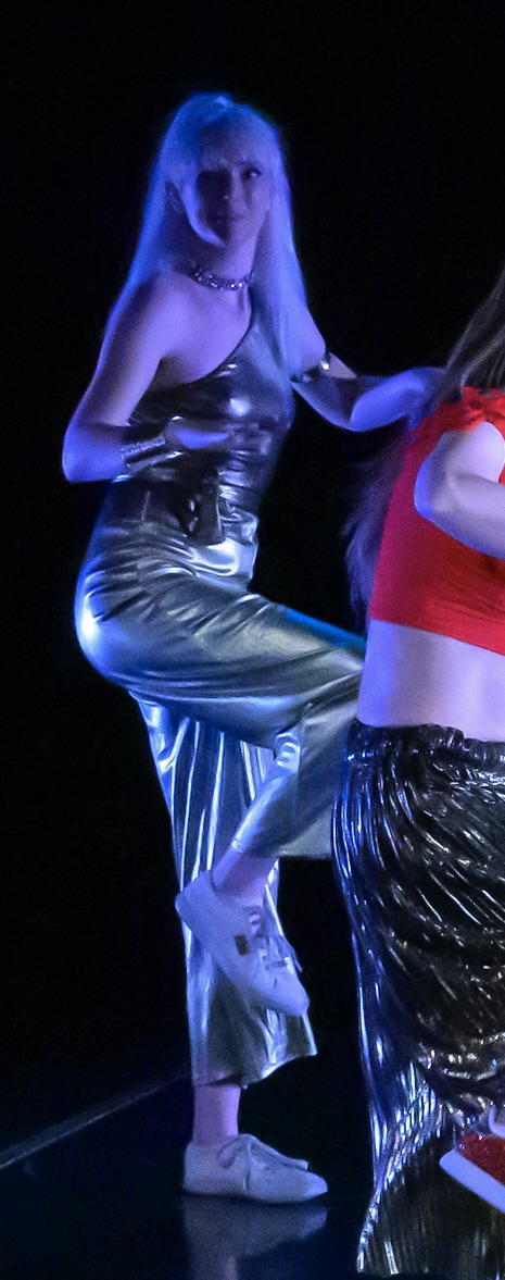 two women in shiny silver pants