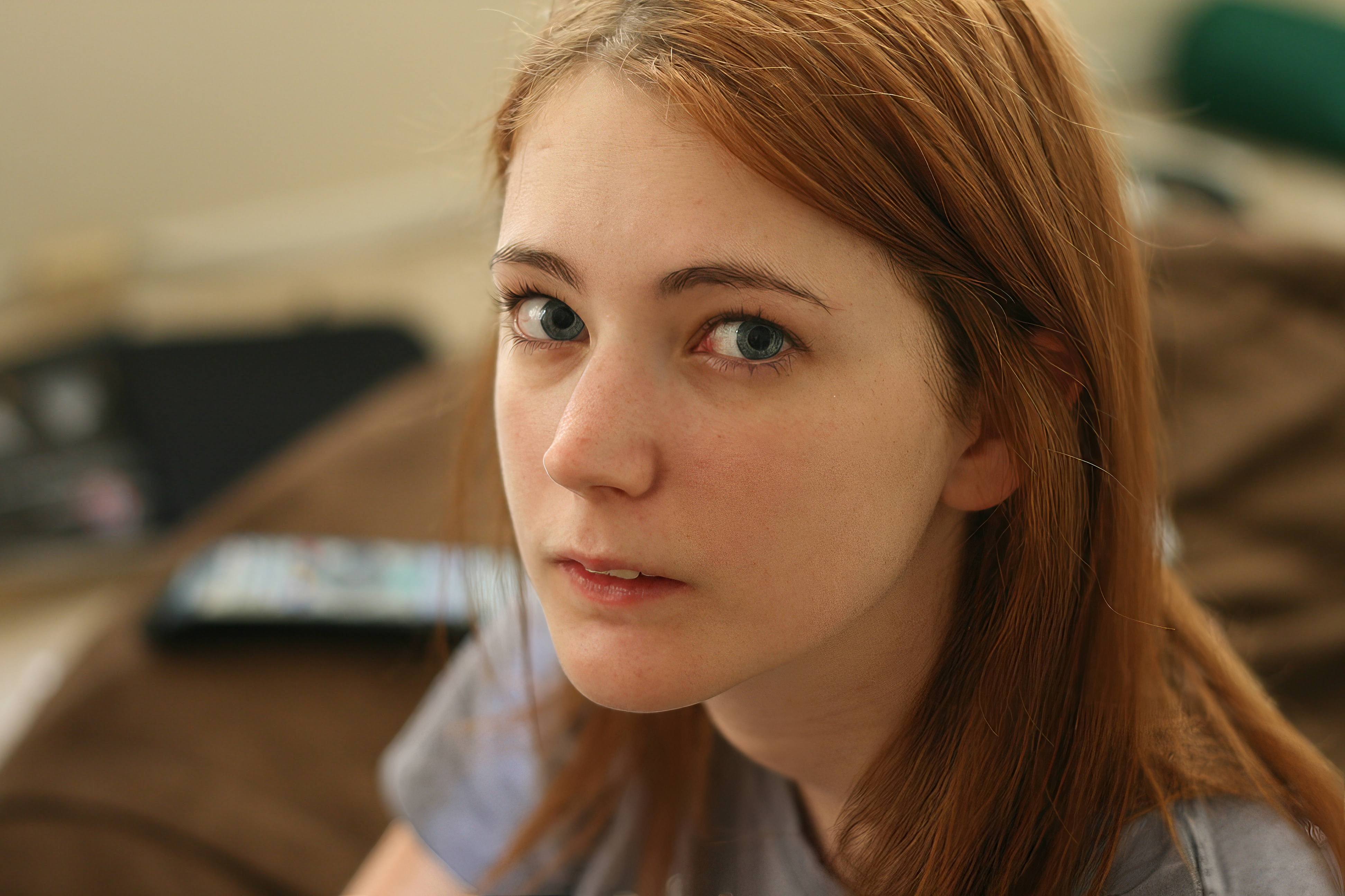 a woman with long red hair