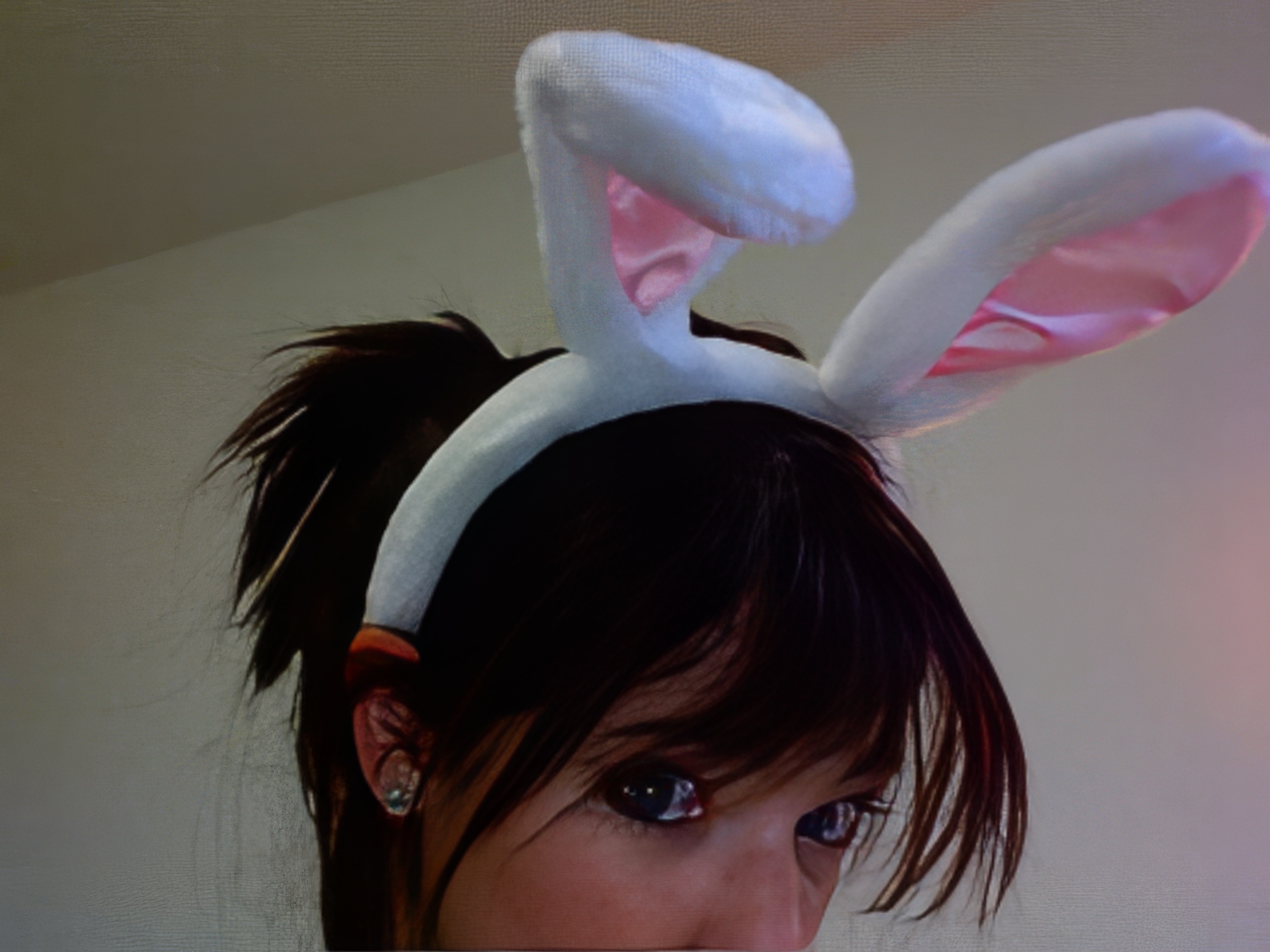 a woman with a bunny ears on her head