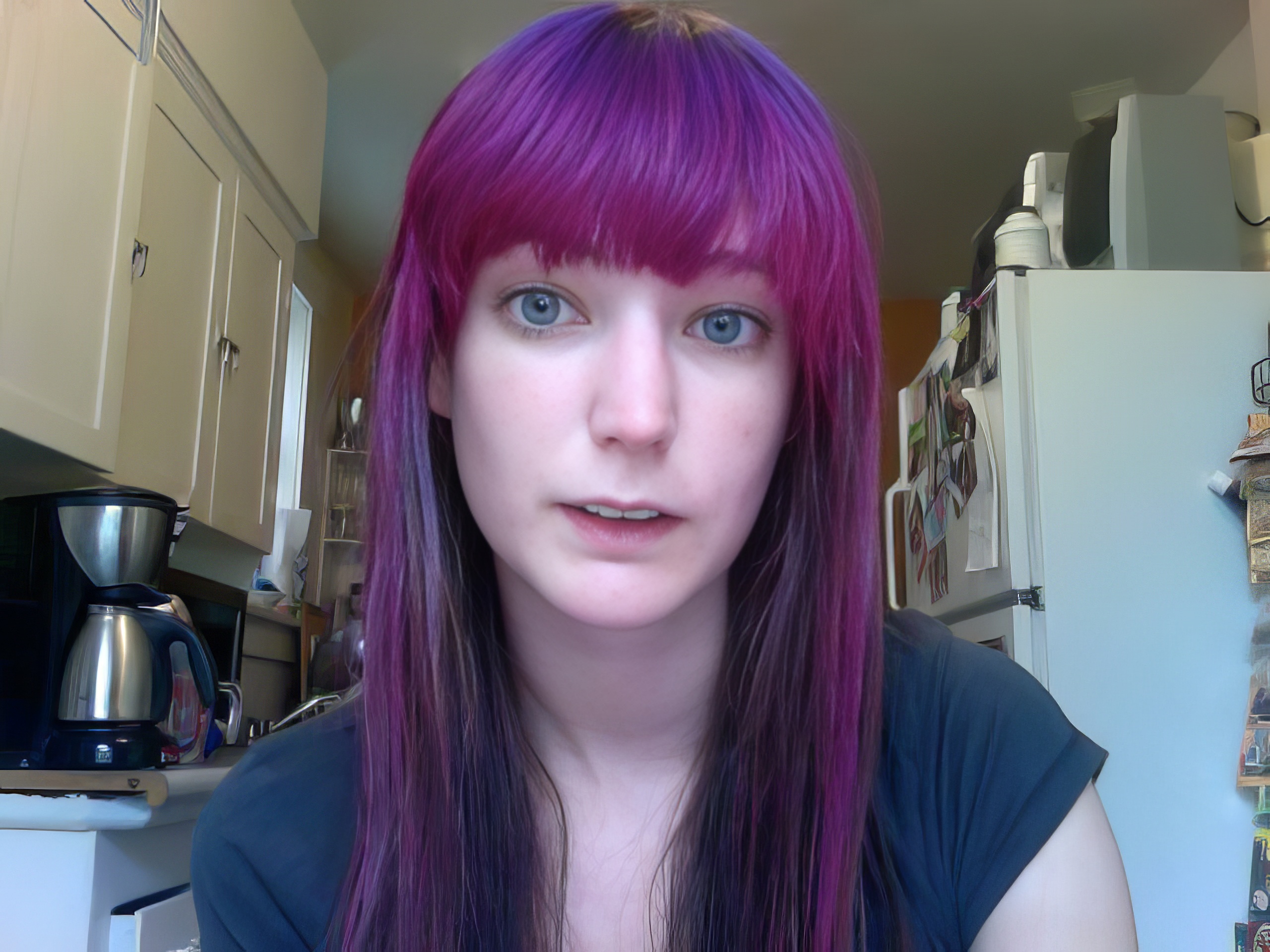 a woman with purple hair