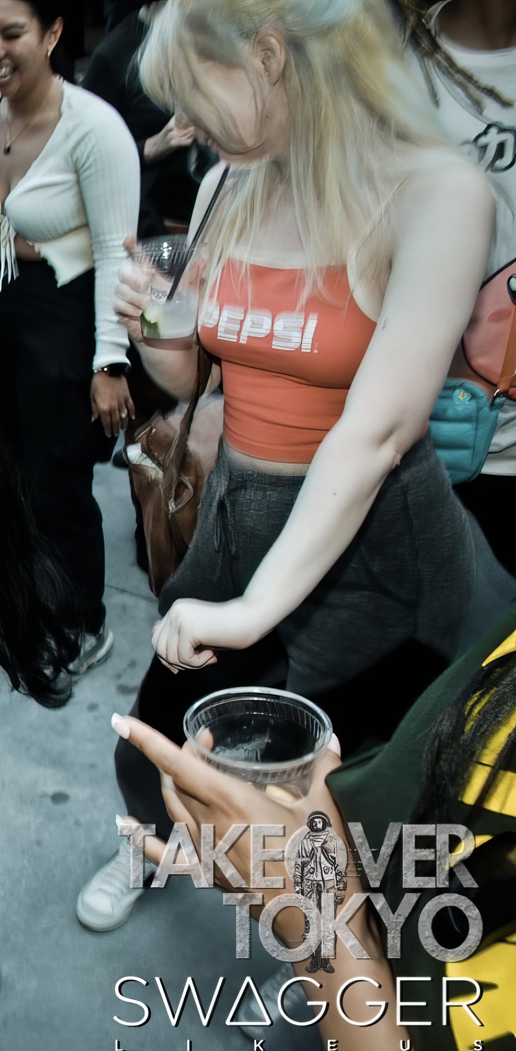 a woman is sitting down and eating a bowl of food