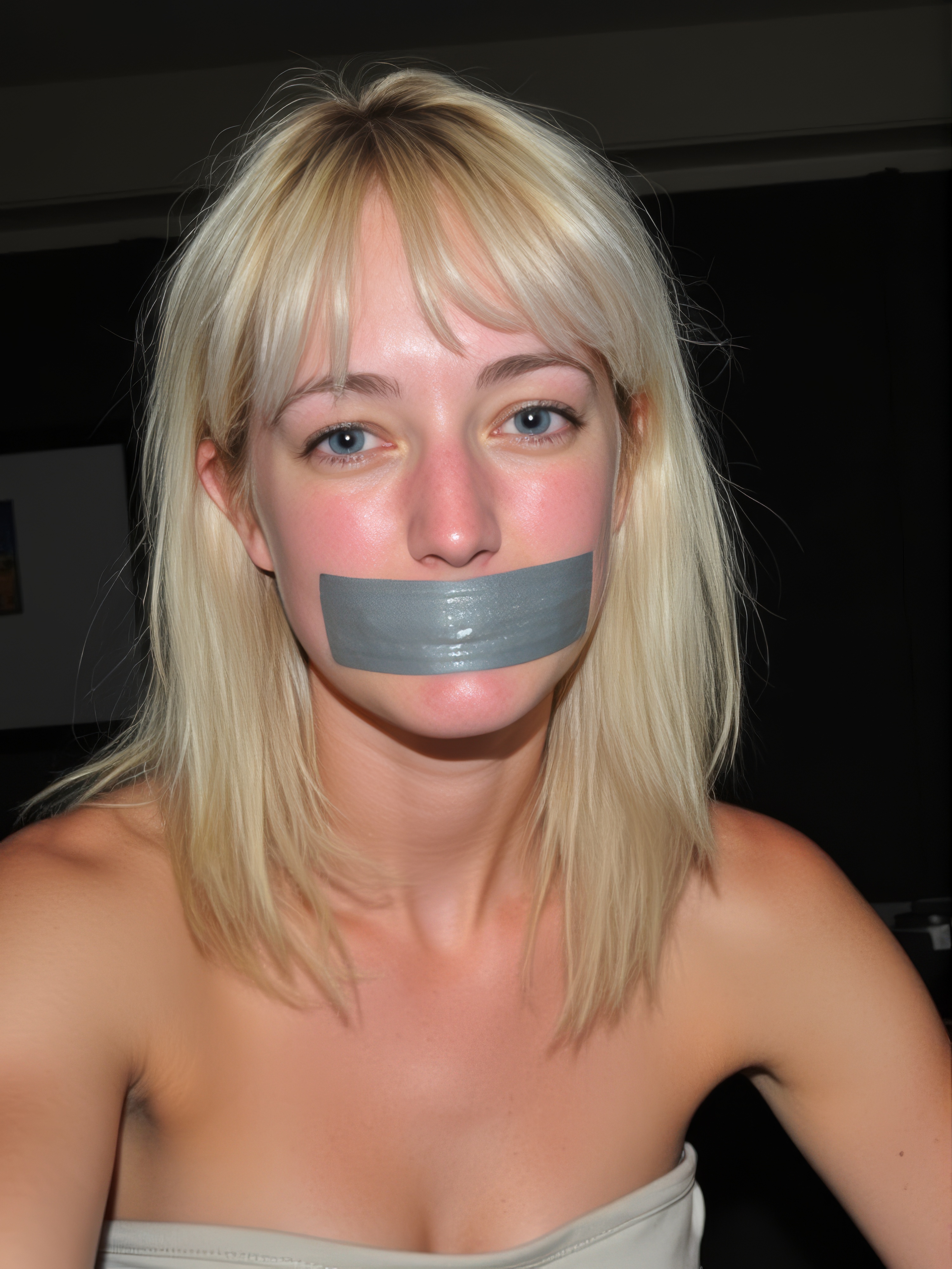 a woman with a tape around her mouth